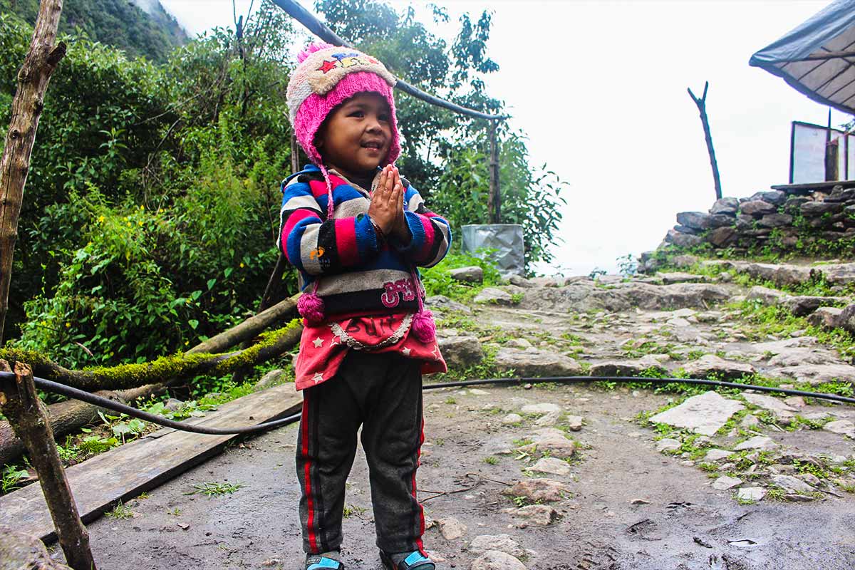 Little girl greeting trekkers